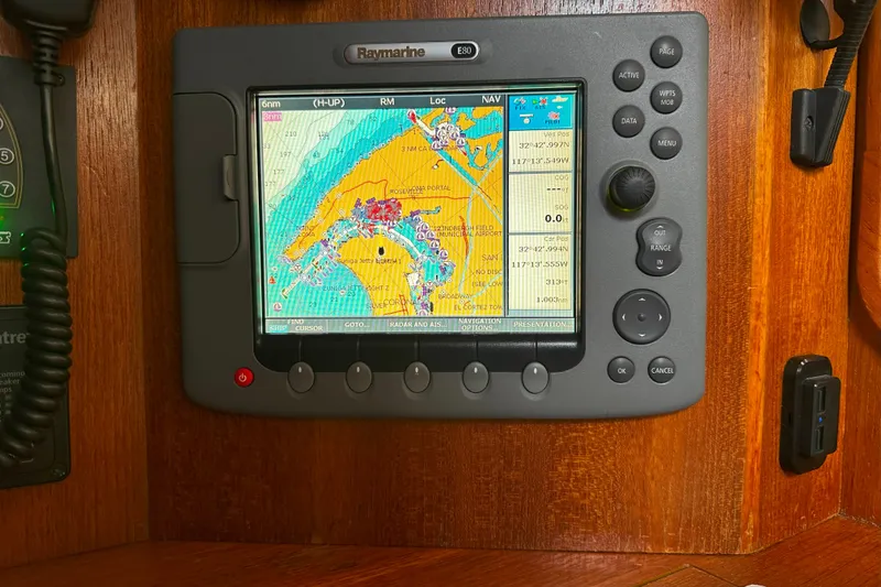 Slide: The Image of Raymarine E80 navigation system on 2006 Hunter 45 CC sailboat, displaying nautical chart. - 42
