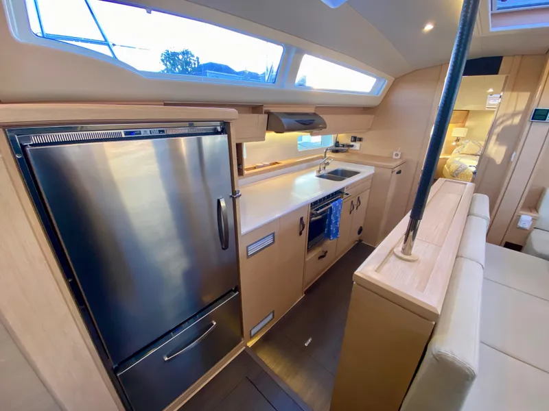Slide: The Image of Modern kitchen interior of 2016 Jeanneau 54 yacht with stainless steel appliances and sleek design. - 28
