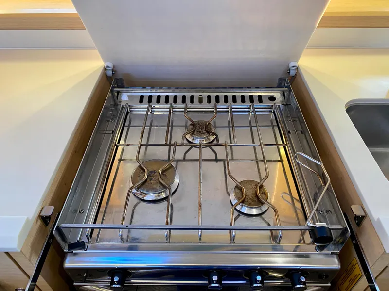 Slide: The Image of Stainless steel stove with three burners on a 2016 Jeanneau 54 yacht. - 29