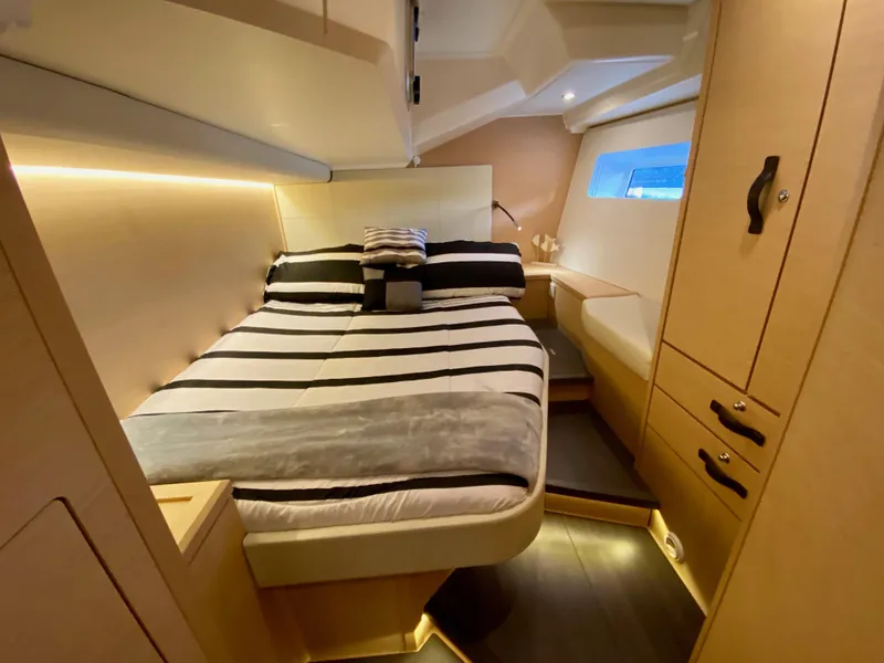Slide: The Image of Luxurious cabin interior of a 2016 Jeanneau 54 yacht with modern furnishings. - 41