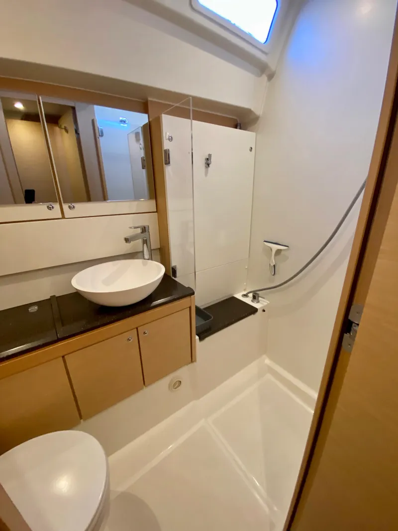 Slide: The Image of Modern bathroom in a 2016 Jeanneau 54 yacht with sleek fixtures and spacious design. - 47