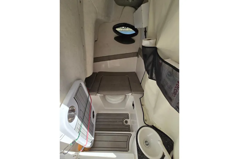 Slide: The Image of Interior cabin of 2022 Sea Fox 249 Avenger boat, featuring seating and storage. - 32