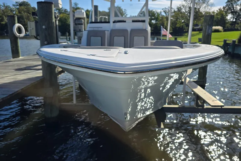 Slide: The Image of 2022 Sea Fox 249 Avenger boat docked on a sunny day. - 7