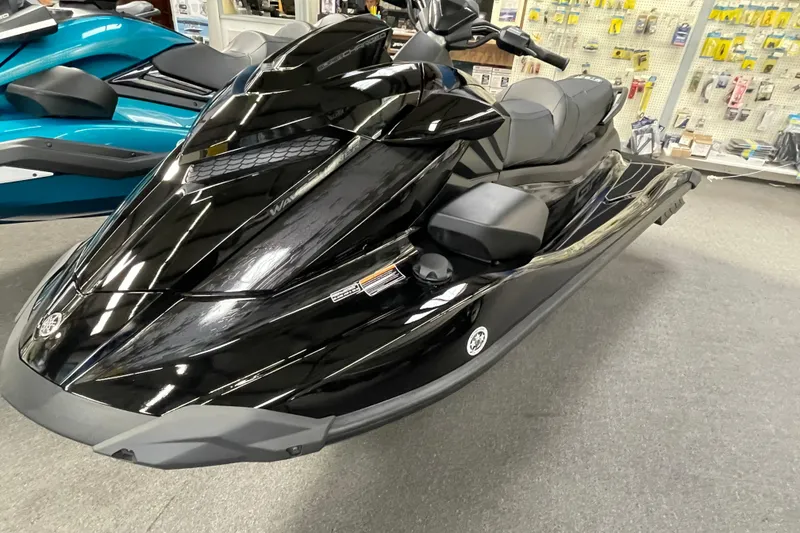 Slide: The Image of 2026 Yamaha WaveRunner GP SVHO in showroom, sleek black design, high-performance watercraft. - 1
