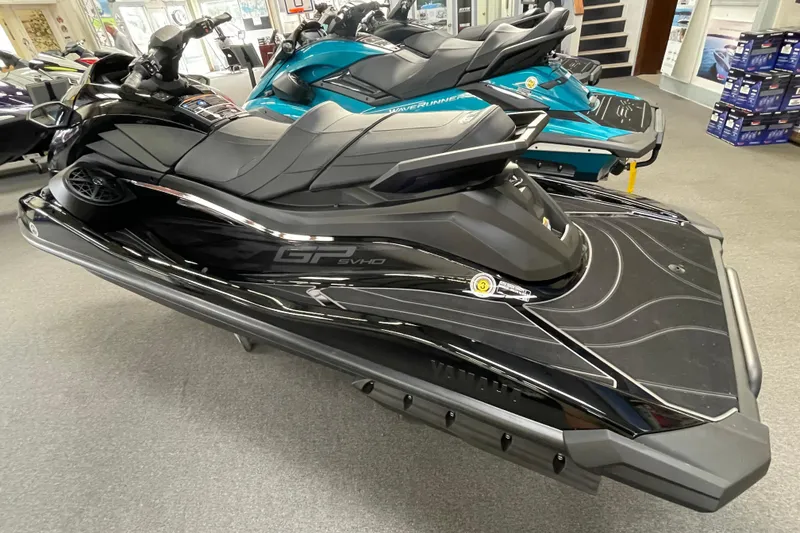 Slide: The Image of 2026 Yamaha WaveRunner GP SVHO in showroom, sleek black design. - 3
