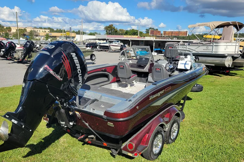 Slide: The Image of 2018 Ranger 2080MS Angler boat with Mercury engine on display outdoors. - 2
