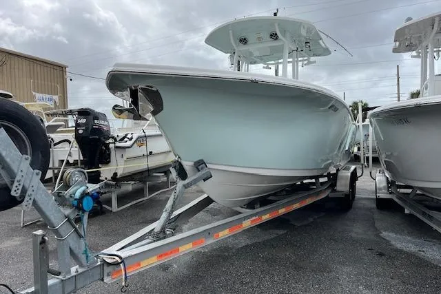 Slide: The Image of 2019 Sea Pro 259 Center Console boat on trailer, parked outdoors. - 14