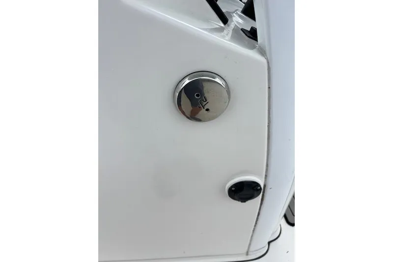 Slide: The Image of 2019 Sea Pro 259 Center Console boat detail with chrome fuel cap. - 5