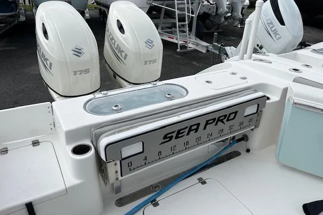 Slide: The Image of 2019 Sea Pro 259 Center Console boat with dual Suzuki 175 engines. - 9