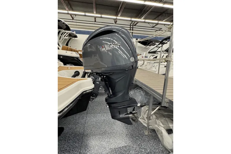 Slide: The Image of 2026 Chaparral 23 SSi OB boat with Yamaha outboard motor in showroom. - 11