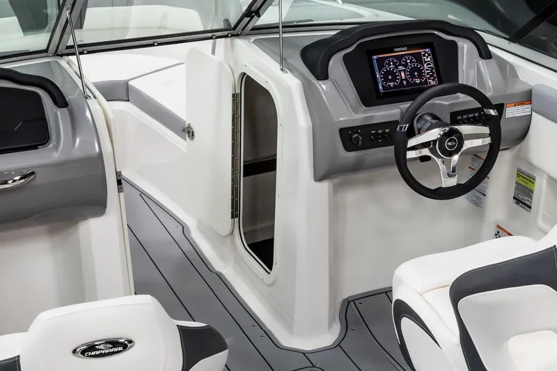 Slide: The Image of Manufacturer Provided Image: 2025 Chaparral 23 SSi OB boat interior with modern dashboard and seating. - 3