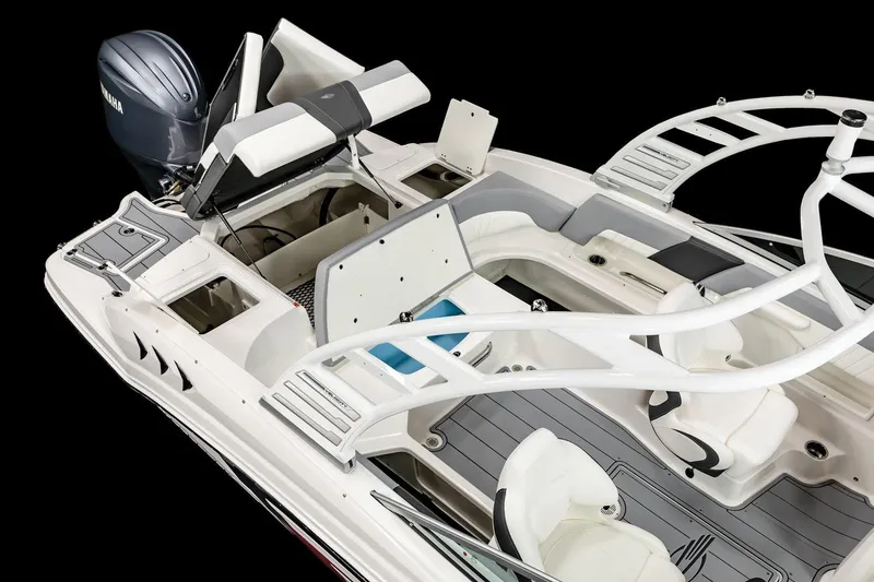 Slide: The Image of Manufacturer Provided Image: 2025 Chaparral 23 SSi OB boat interior with Yamaha outboard motor, featuring sleek seating and design. - 7