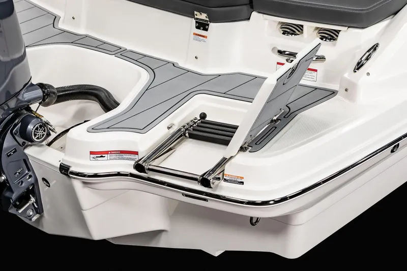Slide: The Image of Manufacturer Provided Image: 2025 Chaparral 23 SSi OB boat interior with sleek seating and modern design. - 9