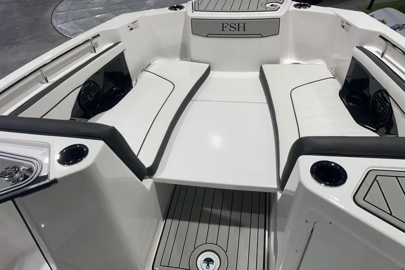 Slide: The Image of 2025 Yamaha Boats 255 FSH Sport H interior with sleek seating and modern design. - 9