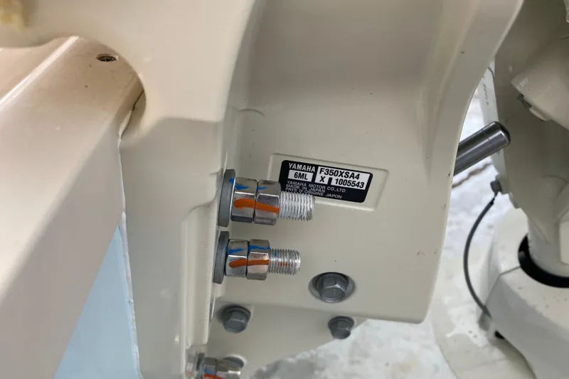 Slide: The Image of Close-up of Yamaha F350XSA4 engine mount on 2026 Grady-White Fisherman 236 boat. - 21