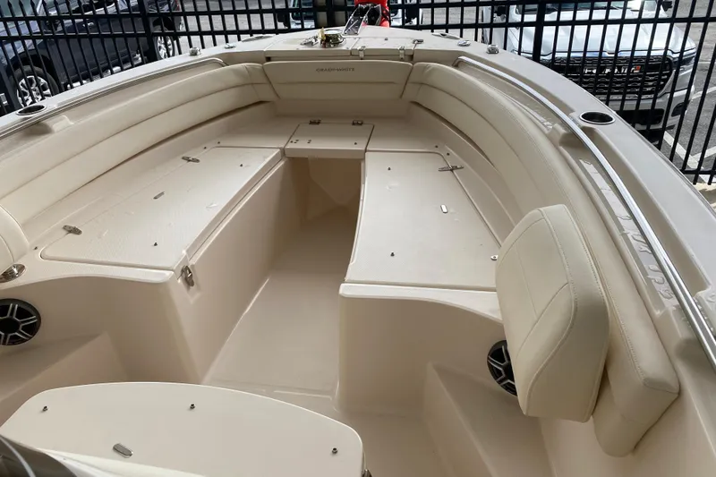 Slide: The Image of 2026 Grady-White Fisherman 236 boat interior with spacious seating and storage compartments. - 6