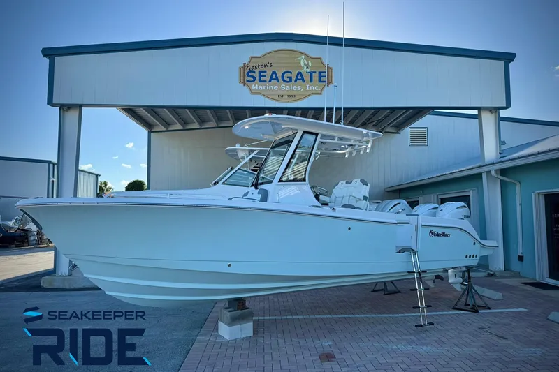 The Image of 2026 Edgewater 250CC boat displayed at Seagate Marine Sales, featuring Seakeeper Ride technology. - 0