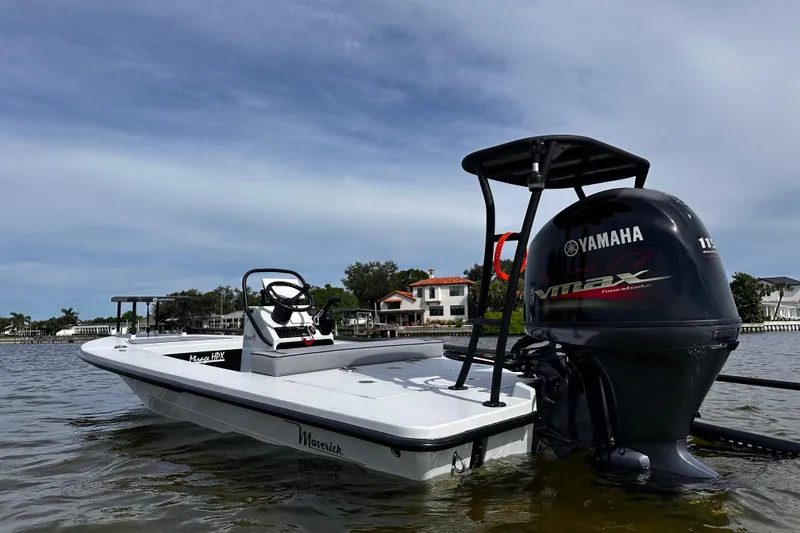 The Image of 2022 Maverick 17 HPX-V boat with Yamaha engine on calm water. - 0