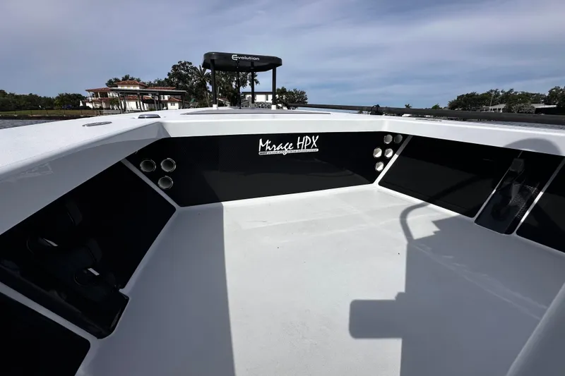 Slide: The Image of 2022 Maverick 17 HPX-V boat interior with Mirage HPX branding, showcasing sleek design. - 15