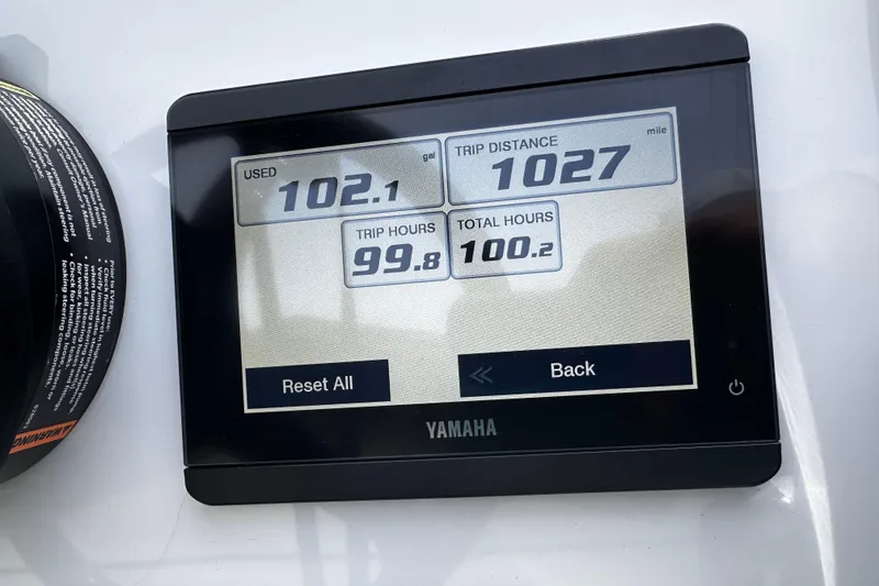 Slide: The Image of Yamaha display showing fuel usage, trip distance, and hours for 2022 Maverick 17 HPX-V. - 19