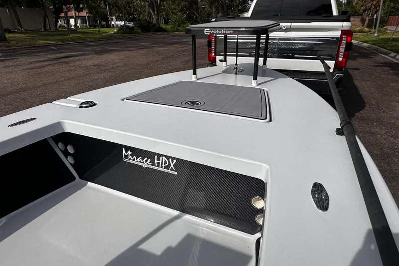 Slide: The Image of 2022 Maverick 17 HPX-V boat on trailer, parked behind a truck. - 20