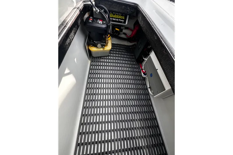 Slide: The Image of Interior of 2022 Maverick 17 HPX-V boat showing equipment and storage area. - 25