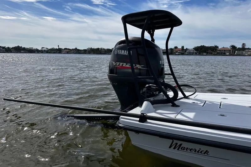 Slide: The Image of 2022 Maverick 17 HPX-V boat with Yamaha outboard motor on calm water. - 4