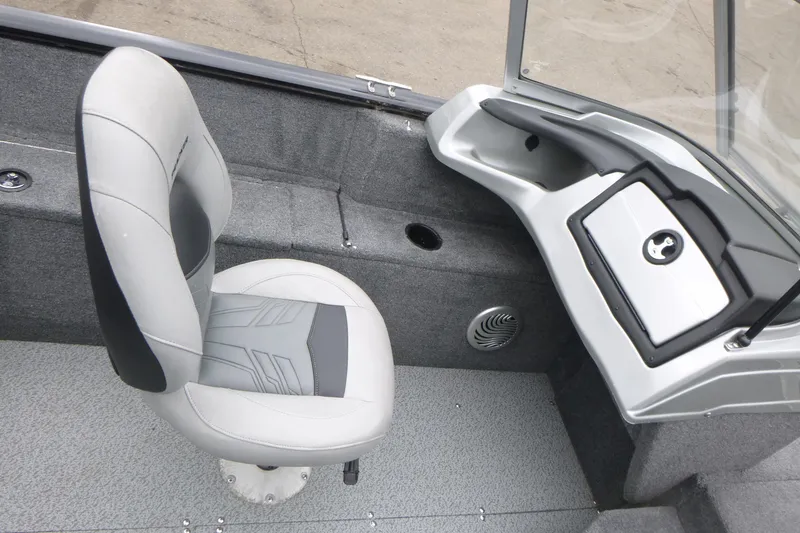 Slide: The Image of 2019 Tracker Pro Guide V-175 Combo boat interior with seat and console. - 14