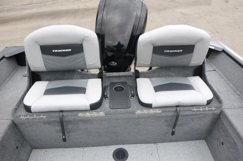 Slide: The Image of 2019 Tracker Pro Guide V-175 Combo boat seats, gray and black design. - 16