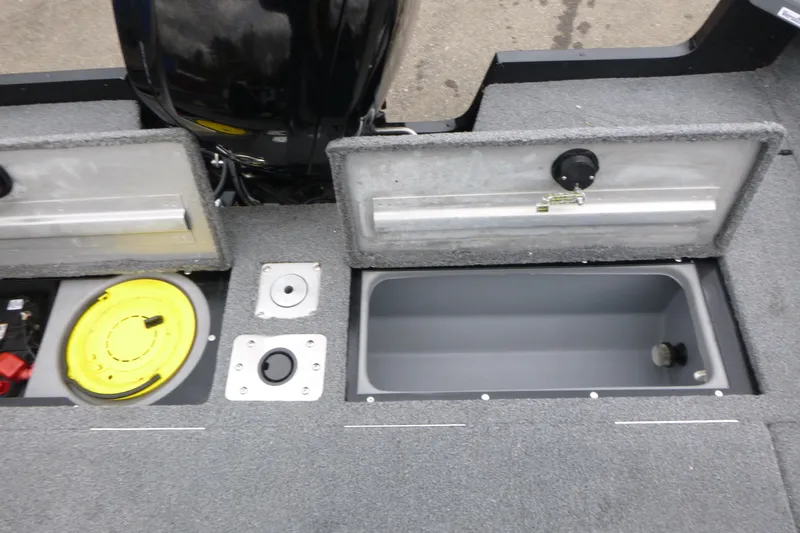 Slide: The Image of 2019 Tracker Pro Guide V-175 Combo boat storage compartments and engine view. - 17