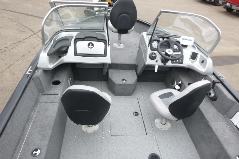 Slide: The Image of 2019 Tracker Pro Guide V-175 Combo boat interior with dual seats and control panel. - 5