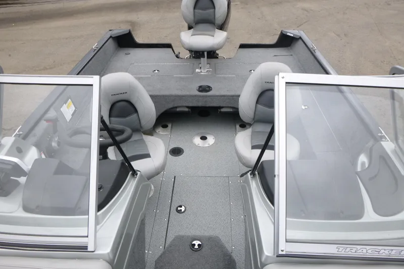 Slide: The Image of 2019 Tracker Pro Guide V-175 Combo boat interior with seating and windshield. - 6