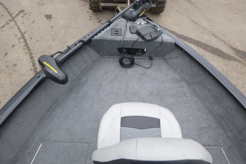 Slide: The Image of 2019 Tracker Pro Guide V-175 Combo boat interior with trolling motor and seat. - 7
