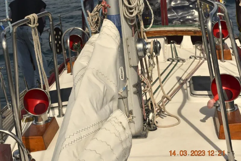 Slide: The Image of Deck view of 1988 Tayana Vancouver 42 sailboat with ropes and winches. - 12
