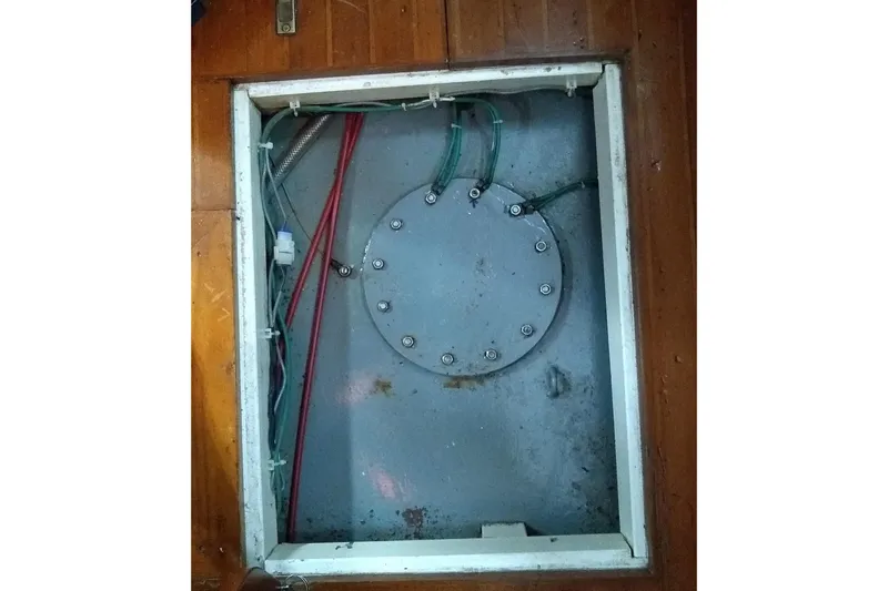 Slide: The Image of Access panel with wiring inside a 1988 Tayana Vancouver 42 sailboat. - 22