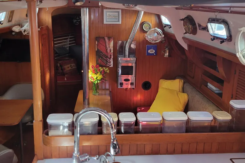 Slide: The Image of Galley kitchen in 1988 Tayana Vancouver 42 sailboat with stove and coffee maker. - 23