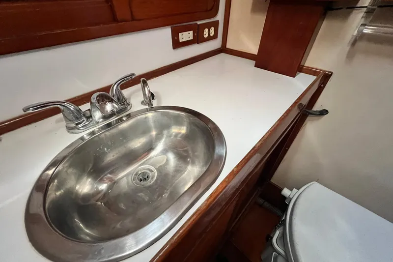 Slide: The Image of Interior of a 1988 Tayana Vancouver 42 yacht with wooden accents. - 42