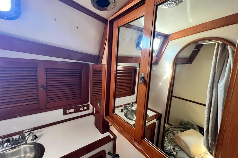 Slide: The Image of 1988 Tayana Vancouver 42 interior with sink. - 43