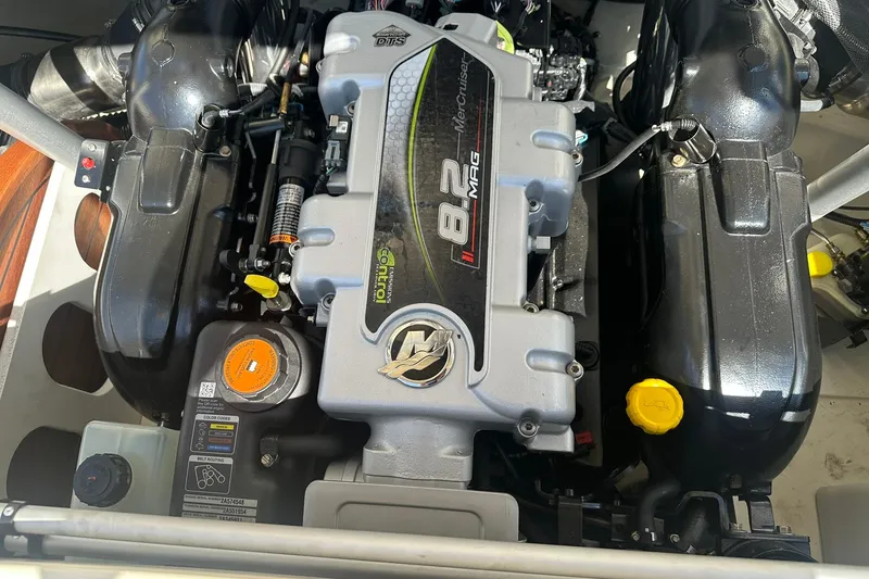 Slide: The Image of 2018 Chris-Craft Launch 27 engine, featuring a powerful 8.2 MAG MerCruiser motor. - 23