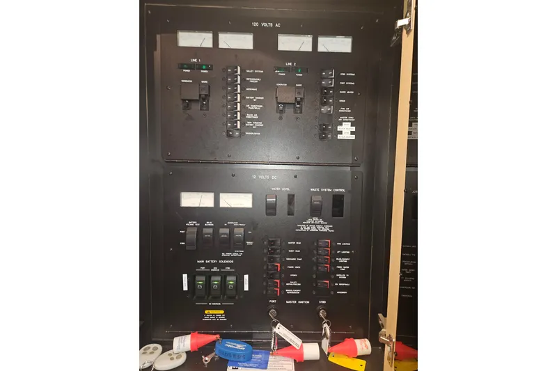 Slide: The Image of Electrical control panel on a 2007 Sea Ray 44 Sedan Bridge yacht. - 52