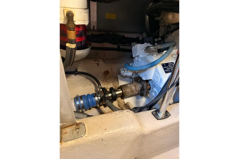 Slide: The Image of Engine compartment of 2007 Sea Ray 44 Sedan Bridge, showing mechanical components. - 60