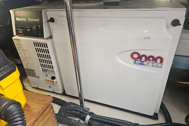 Slide: The Image of Onan marine generator in a 2007 Sea Ray 44 Sedan Bridge yacht. - 66