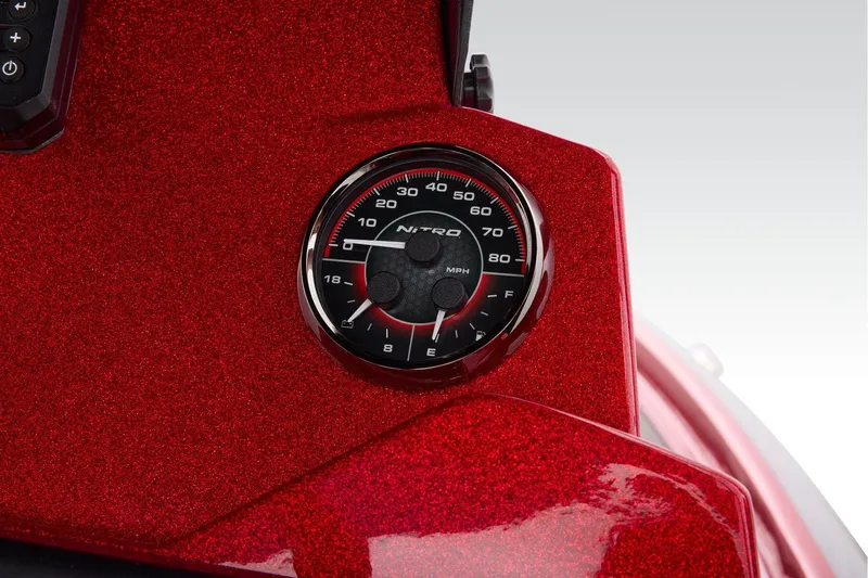 Slide: The Image of Manufacturer Provided Image: Red Nitro Z20 XL 2026 boat with green tools and water bottle in holder. - 37