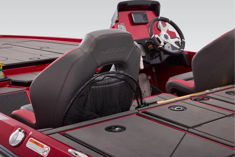 Slide: The Image of Manufacturer Provided Image: 2026 Nitro Z20 XL boat interior with red and black seating and steering wheel. - 50
