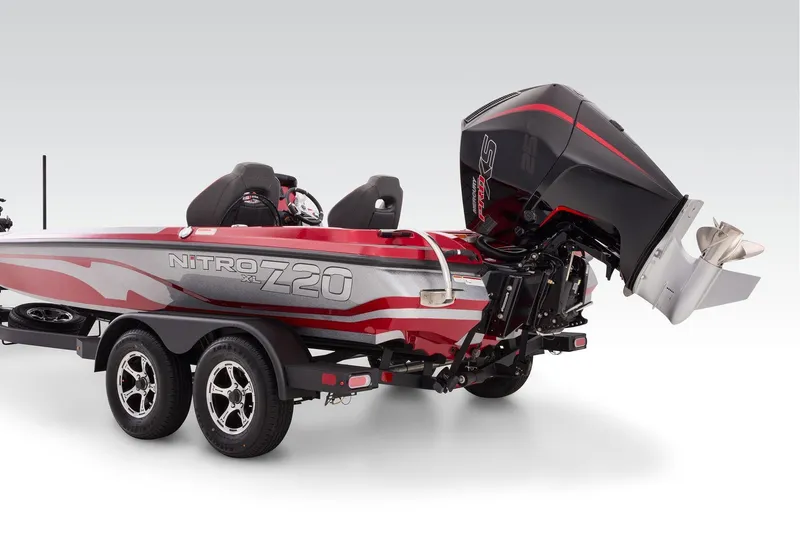 Slide: The Image of Manufacturer Provided Image: 2026 Nitro Z20 XL boat interior with red and black seating, storage compartments, and Mercury engine. - 62