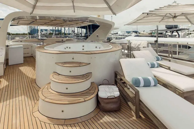 Slide: The Image of Luxurious deck of 2007 Benetti 120 Classic yacht with jacuzzi and sun loungers. - 18