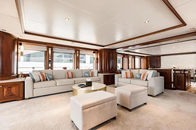 Slide: The Image of Luxurious interior of 2007 Benetti 120 Classic yacht with elegant seating and wooden accents. - 26