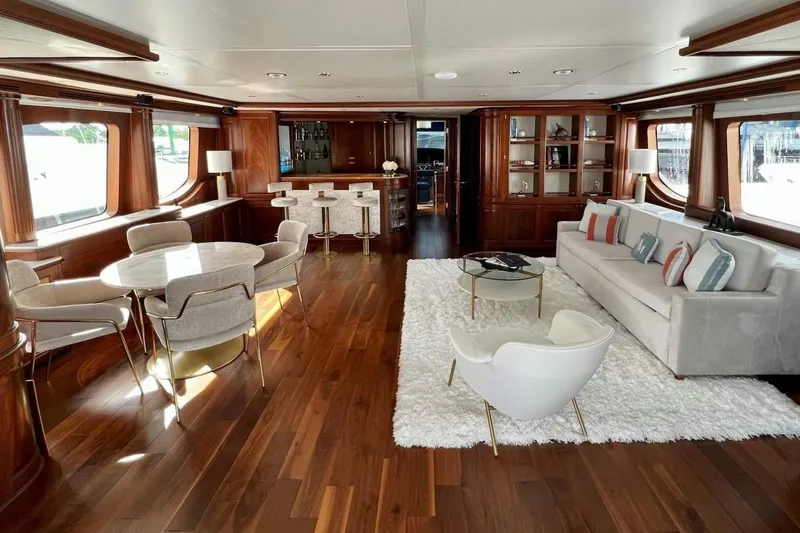 Slide: The Image of Luxurious interior of 2007 Benetti 120 Classic yacht with elegant furnishings and wooden flooring. - 32