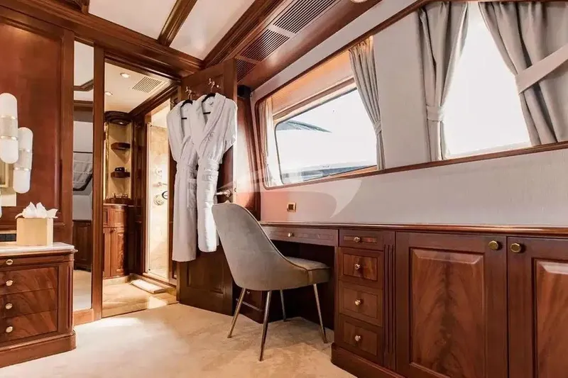 Slide: The Image of Luxurious interior of 2007 Benetti 120 Classic yacht with elegant wood furnishings. - 38