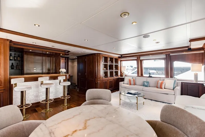 Slide: The Image of Luxurious interior of 2007 Benetti 120 Classic yacht with elegant bar and seating area. - 39